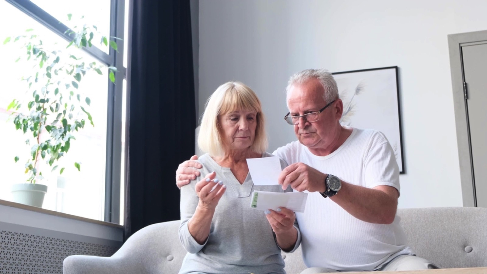 Upset couple seeing bill