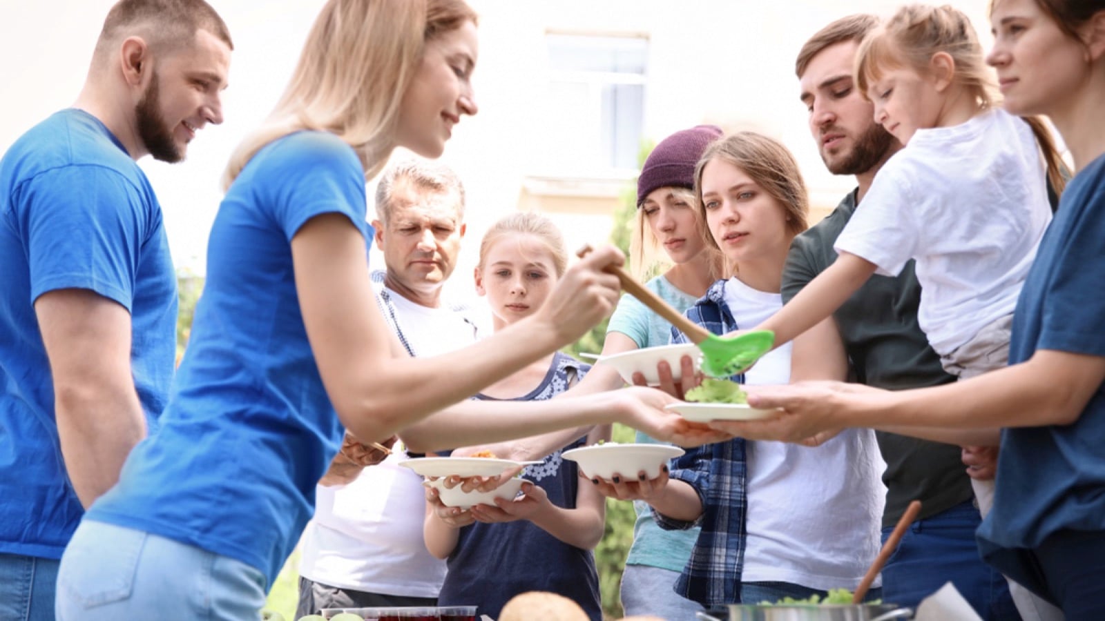 Volunteers serving poor