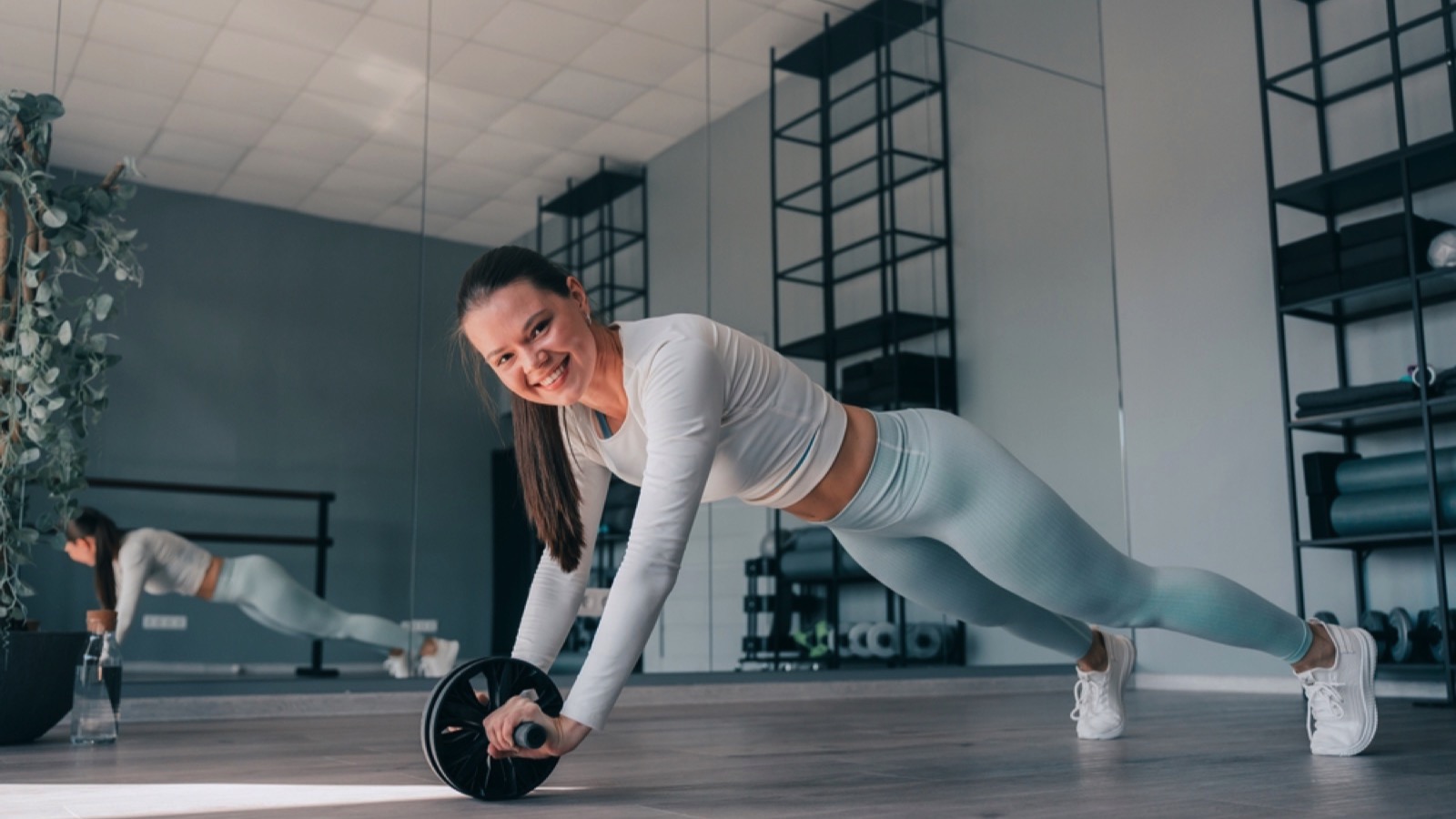 Woman exercising with roller