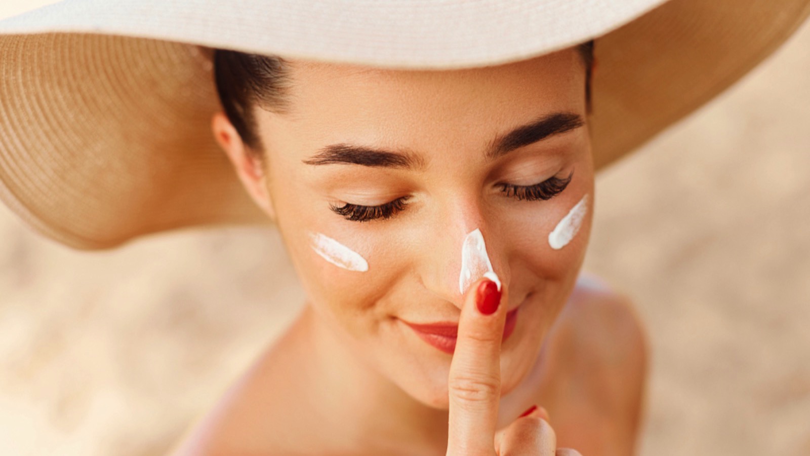 Woman wearing sunscreen