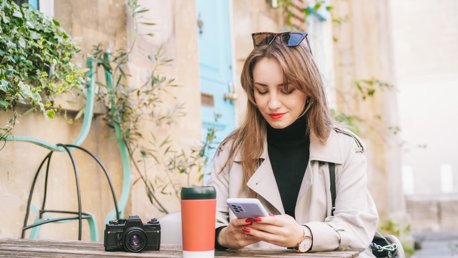 Female,Traveler,Chatting,,Sharing,Files,,Resting,In,Cafe,Terrace,Table