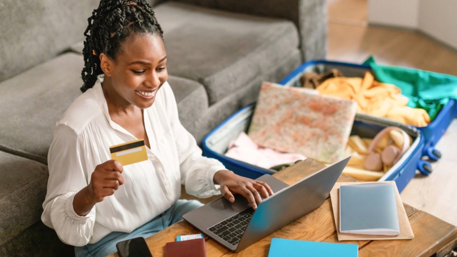 African woman traveler booking flight copy