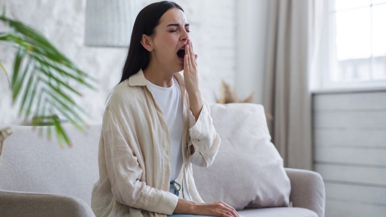 Beautiful woman yawning