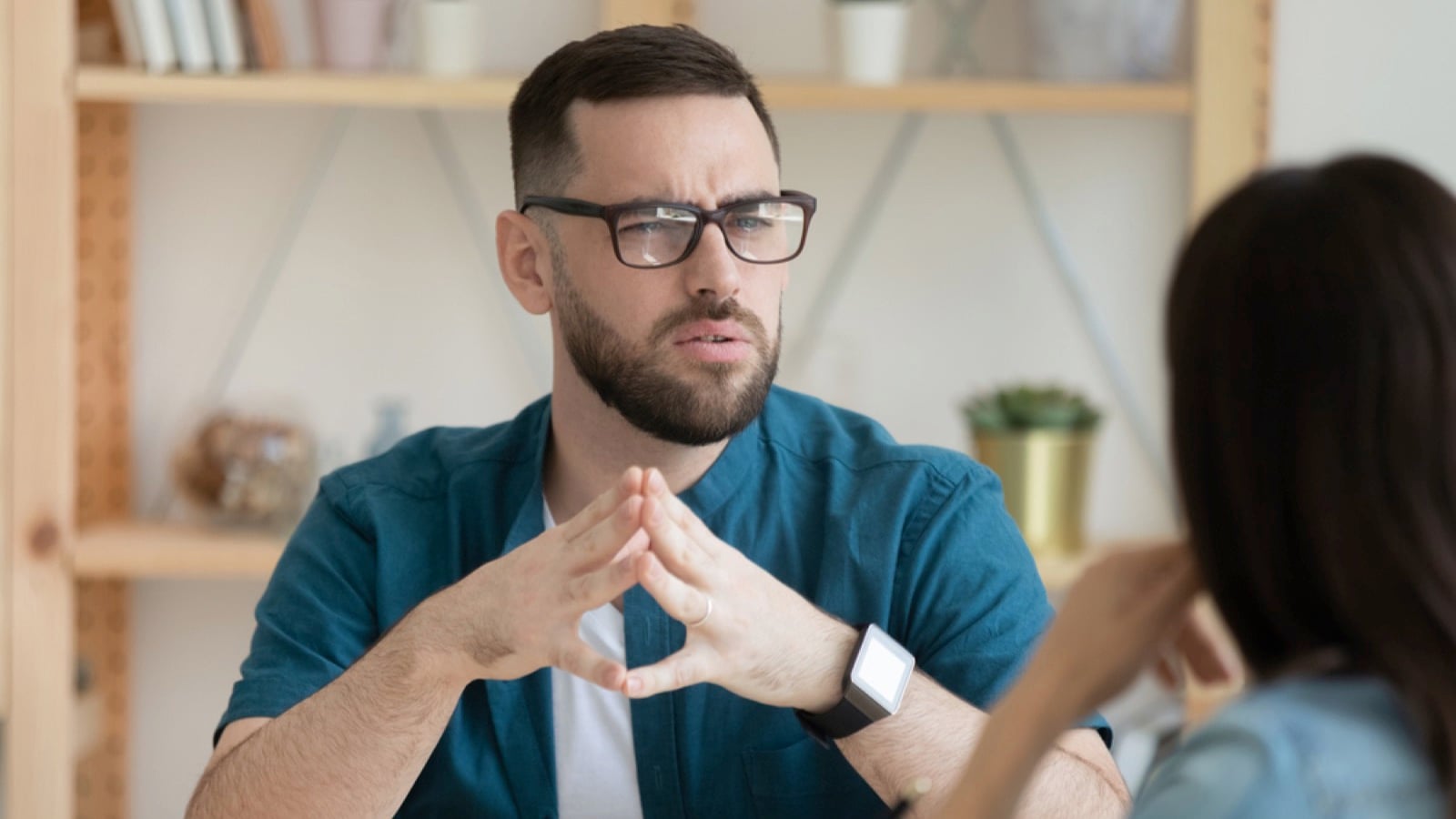 Confident man talking in interview