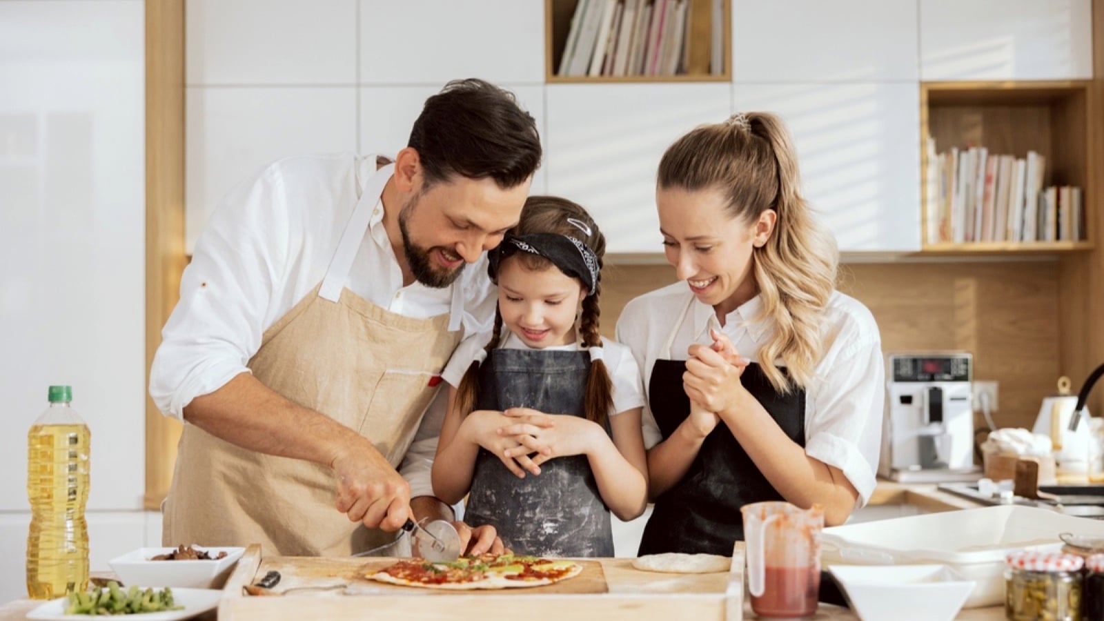 Family cooking Pizza
