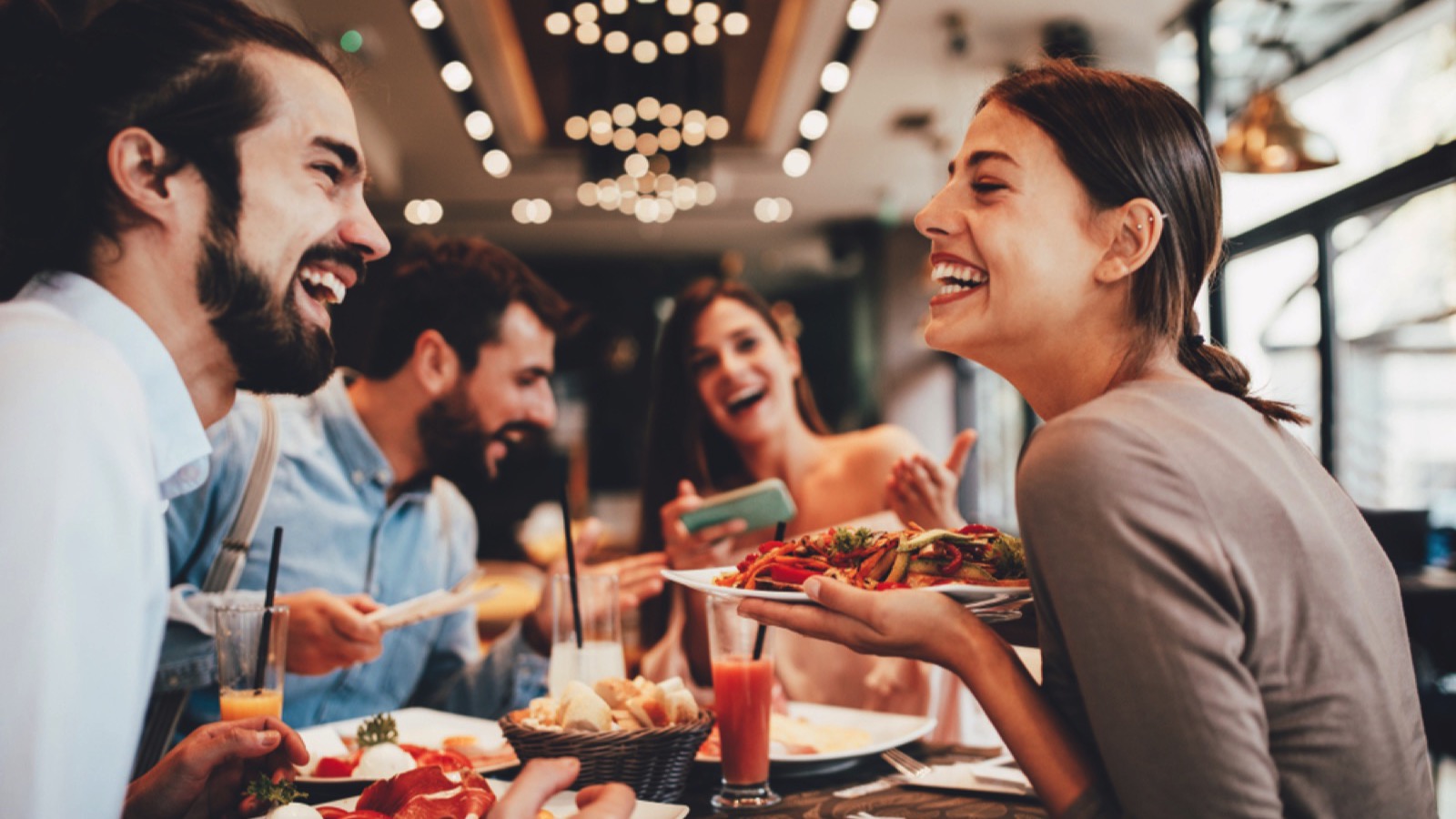 Friends eating in cafe