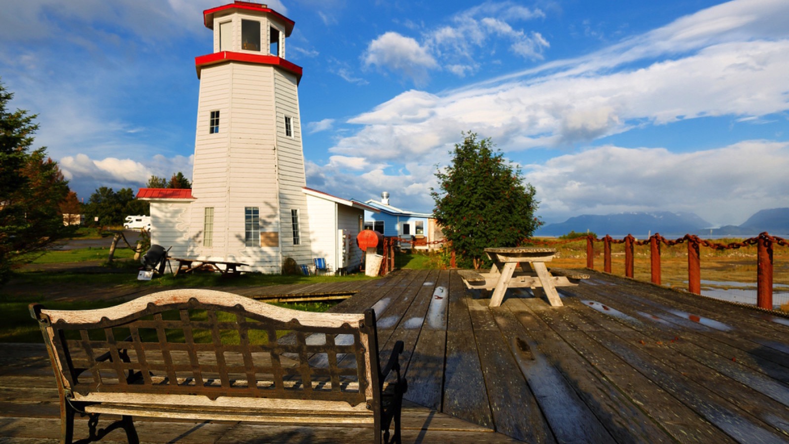 Homer Spit Lighthouse at sunset. Homer is a town on the north side of the entrance to Kachemak Bay from Cook Inlet, south of Anchorage, Alaska, USA.