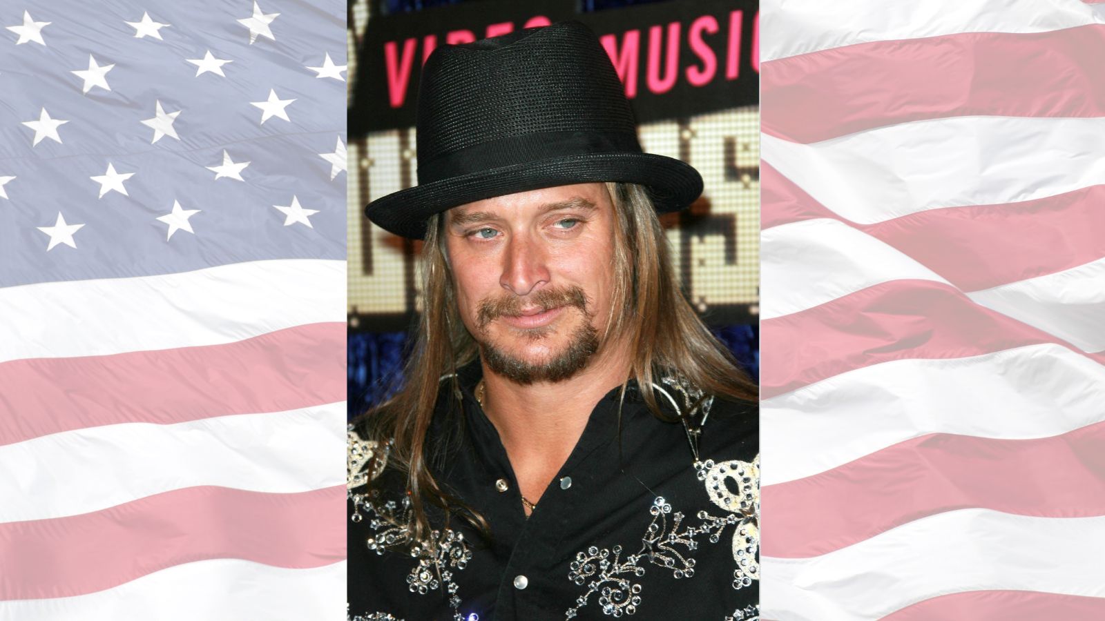 Kid Rock with American flag background