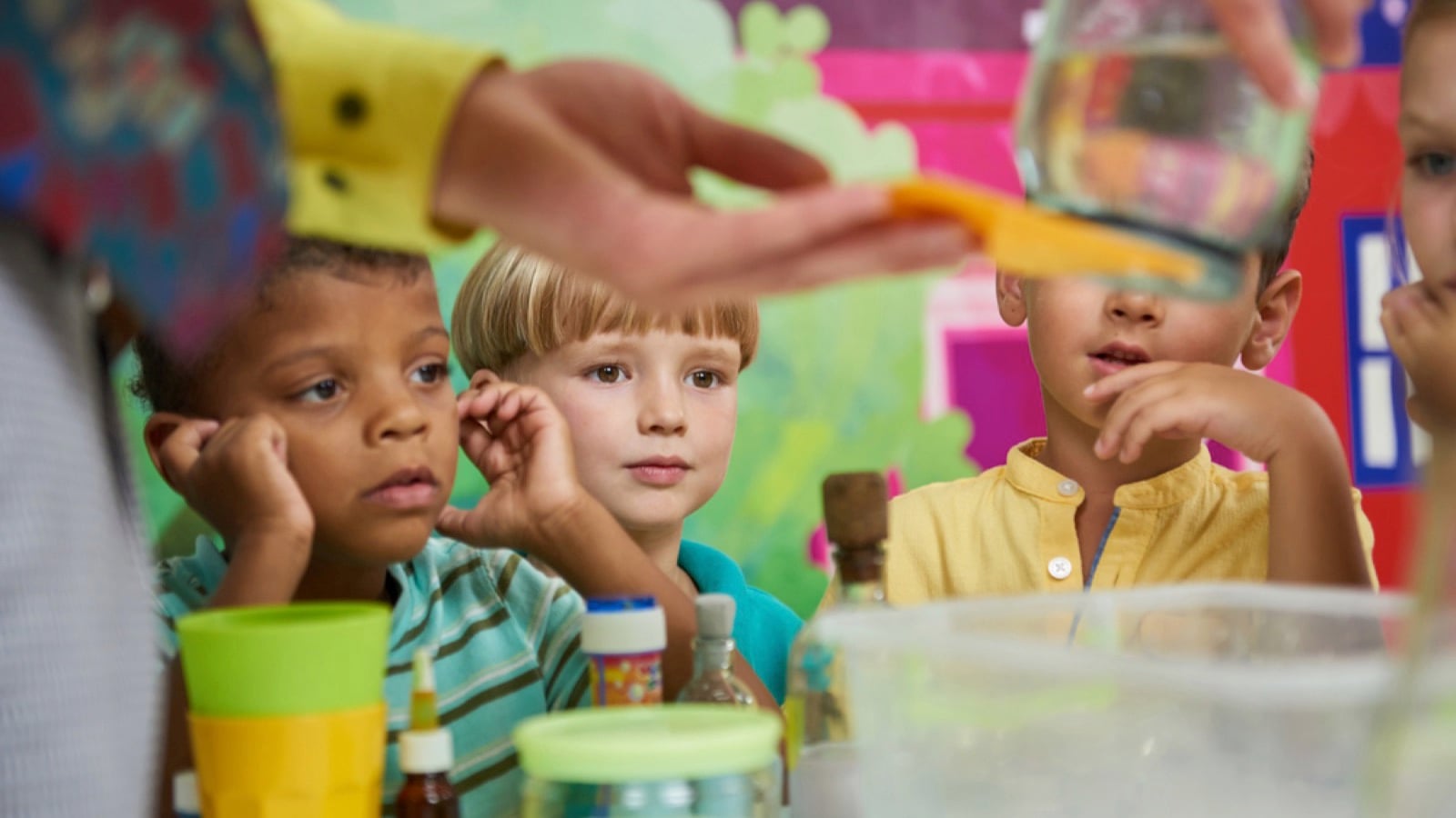 Kids watching chemistry experiment