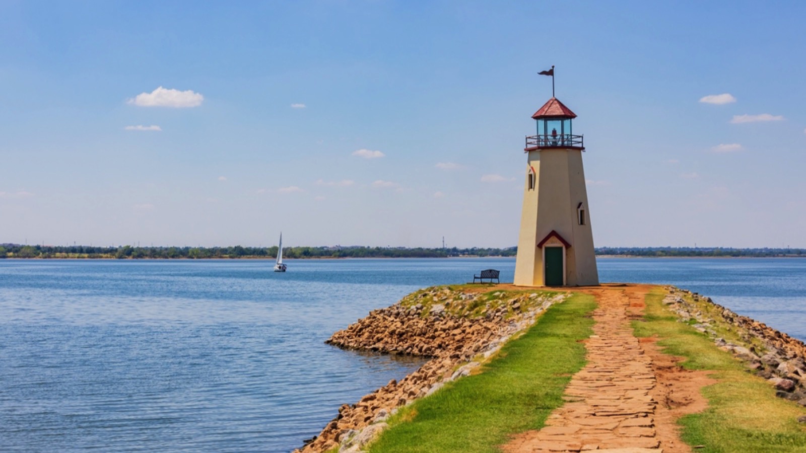 Lake Hefner lighthouse with a sailing boat at Oklahoma