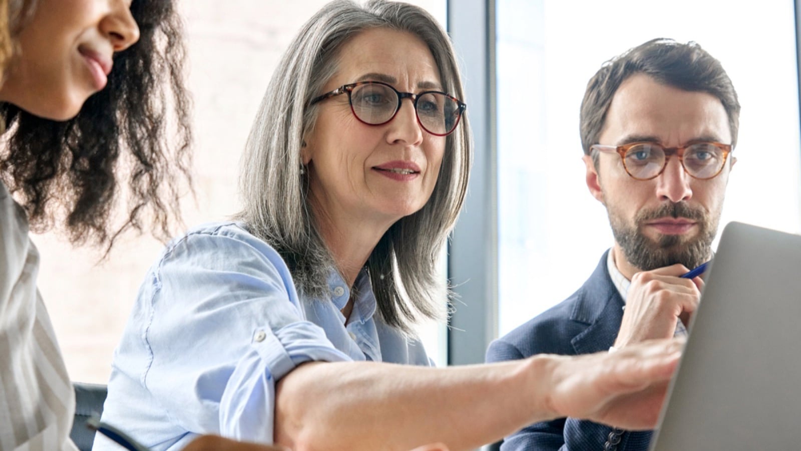 Manager explaining to team