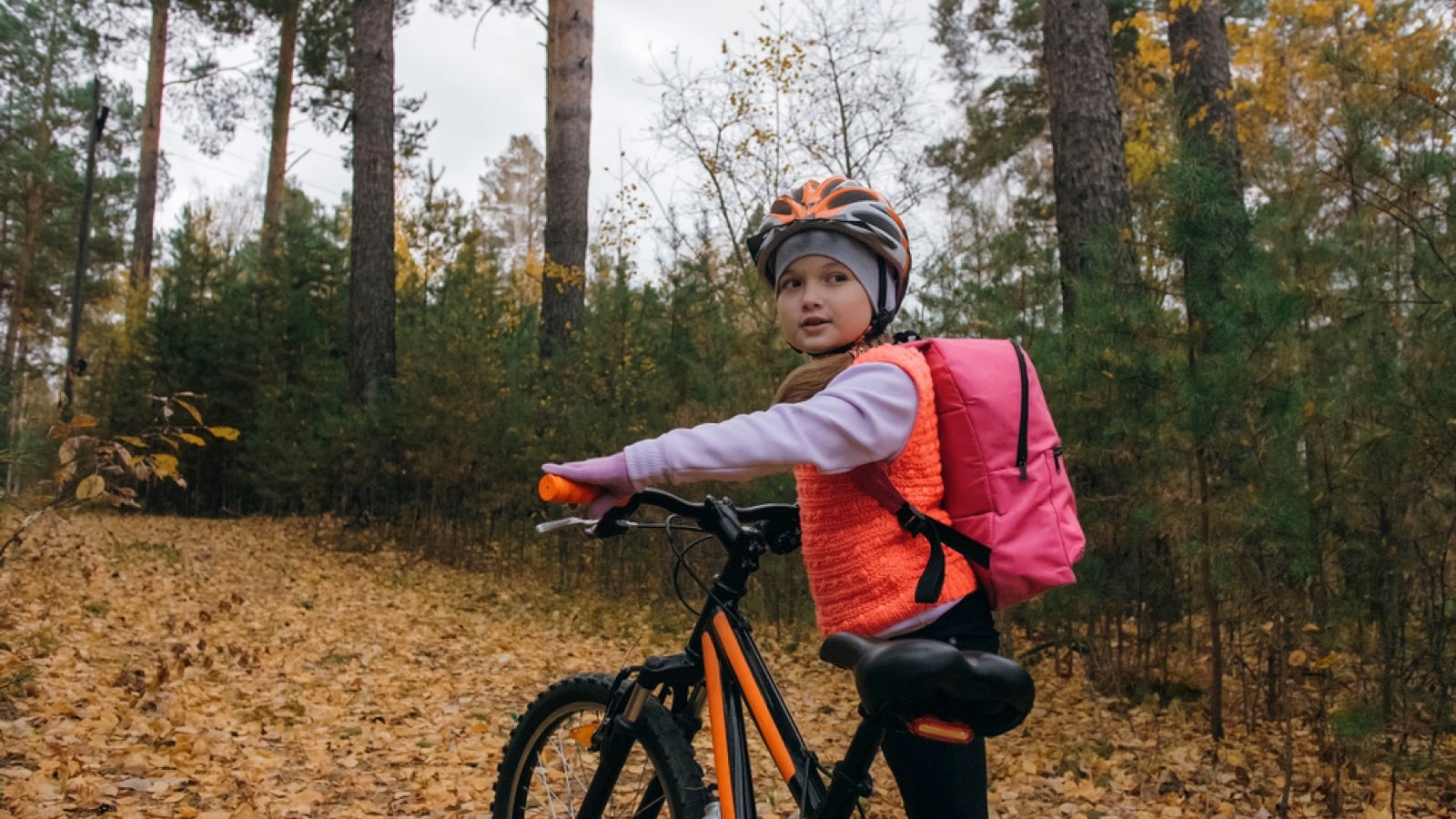 Mountain biking through woods