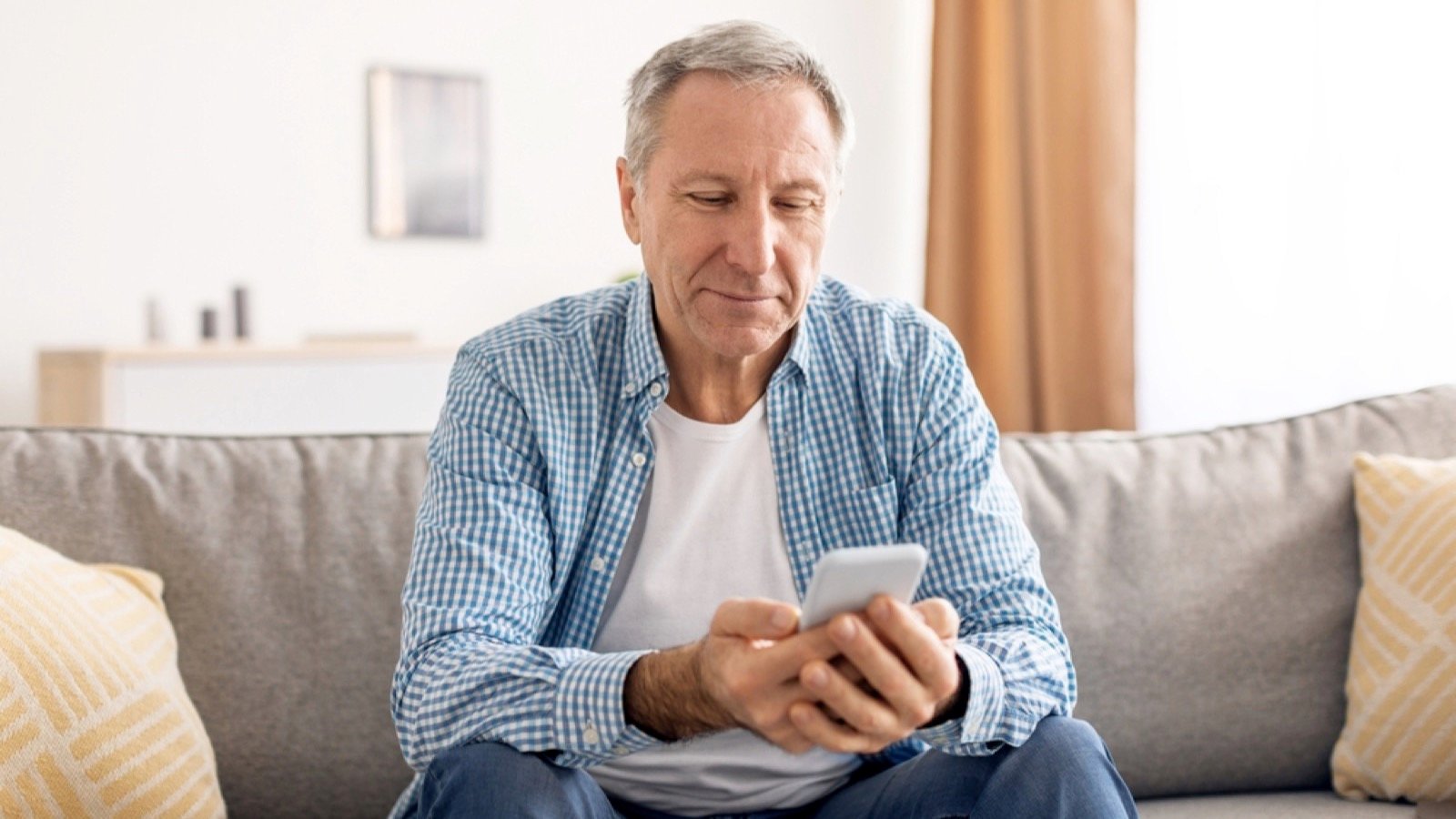 Old man using mobile