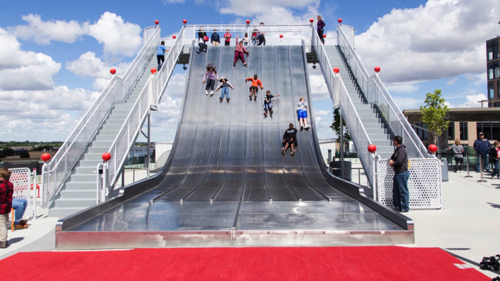 Slide down the giant Team Slide at the Slide Zone at JUMP in downtown Boise