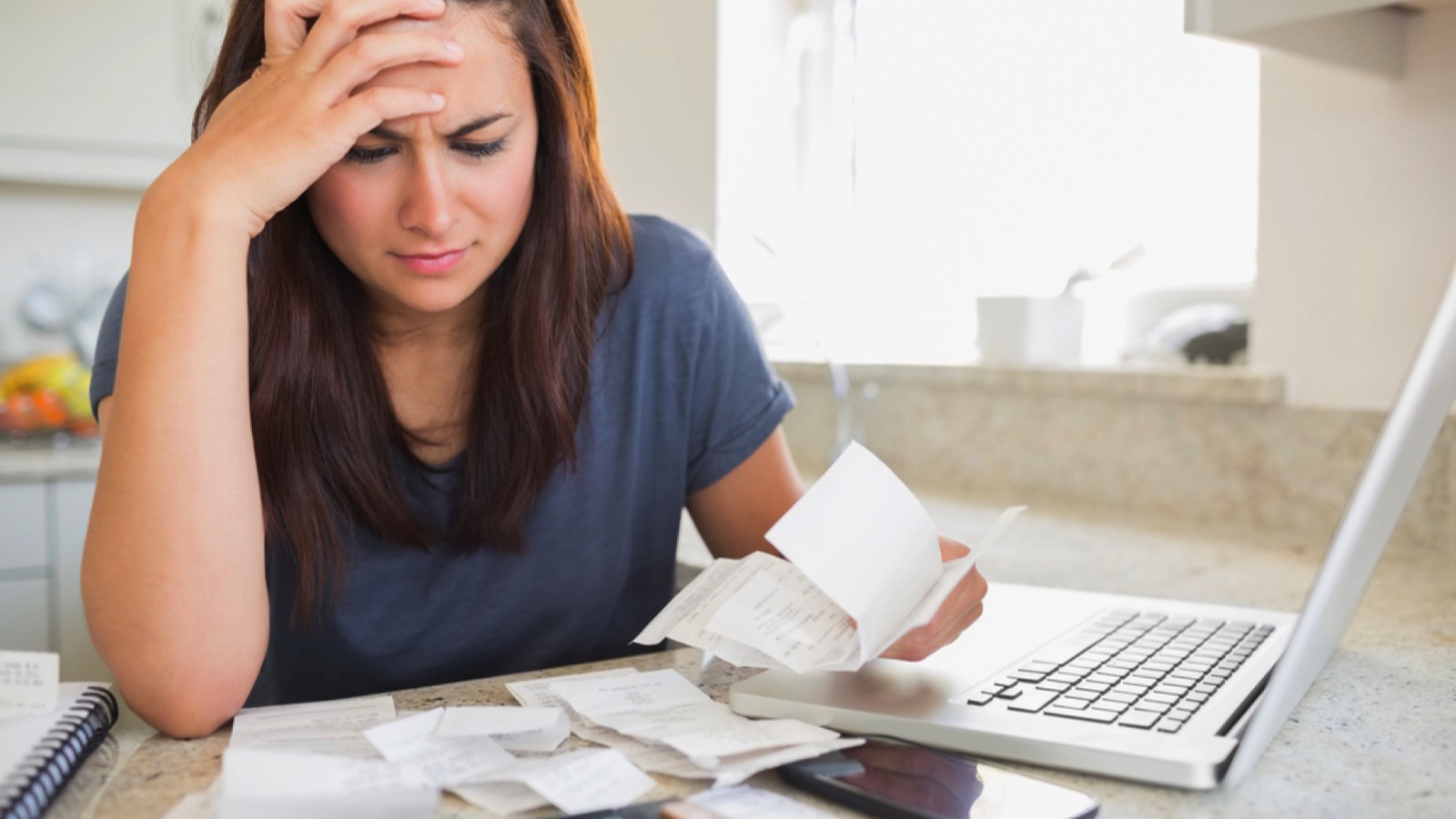 Woman feeling anxiety about money