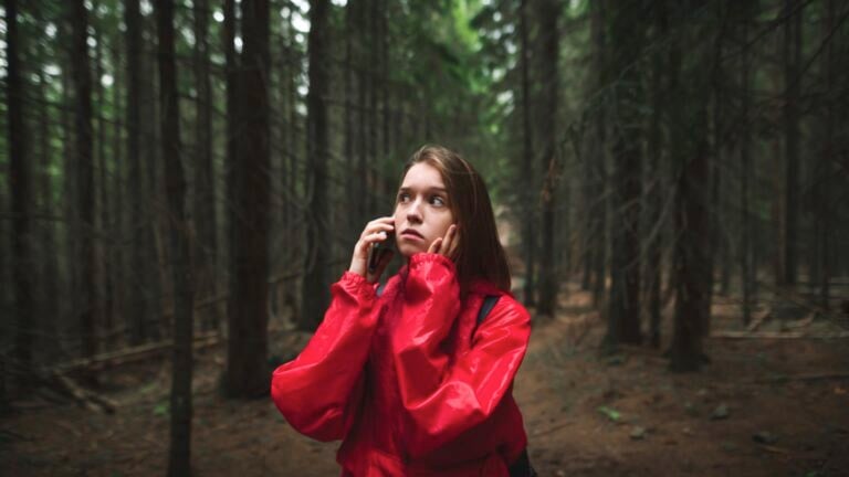 Woman in middle of forest scared