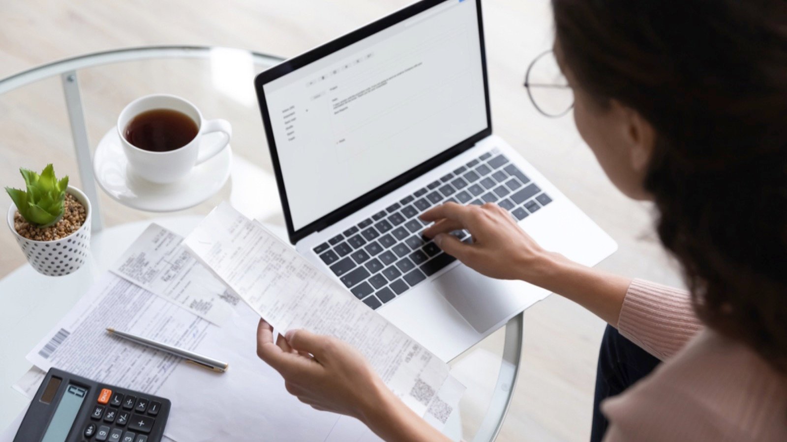 Woman tracking bill and expense