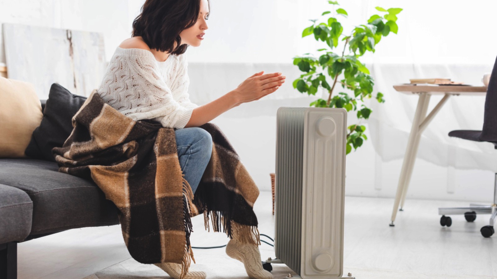 Woman using Space Heater