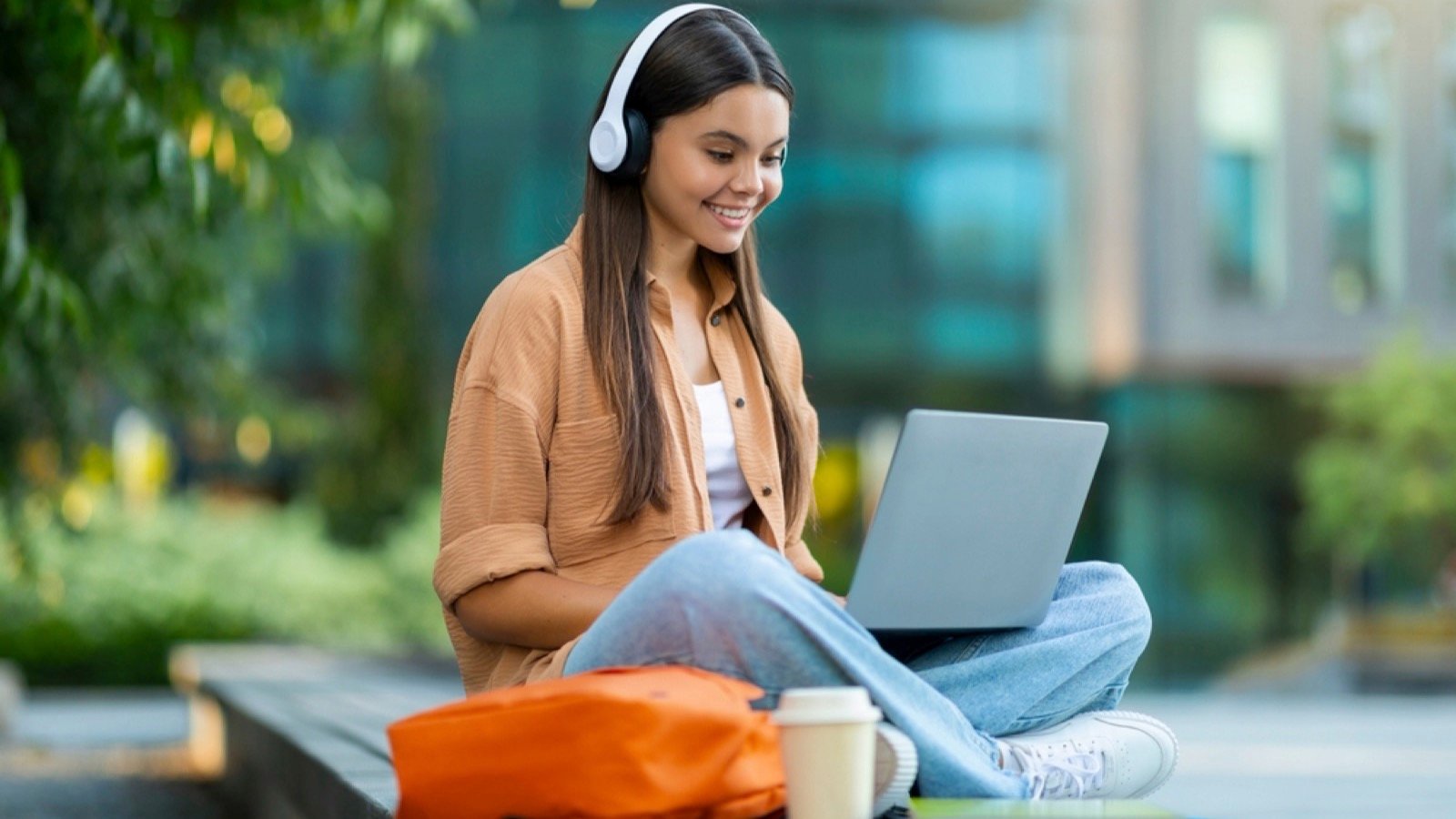 Young student attending online course