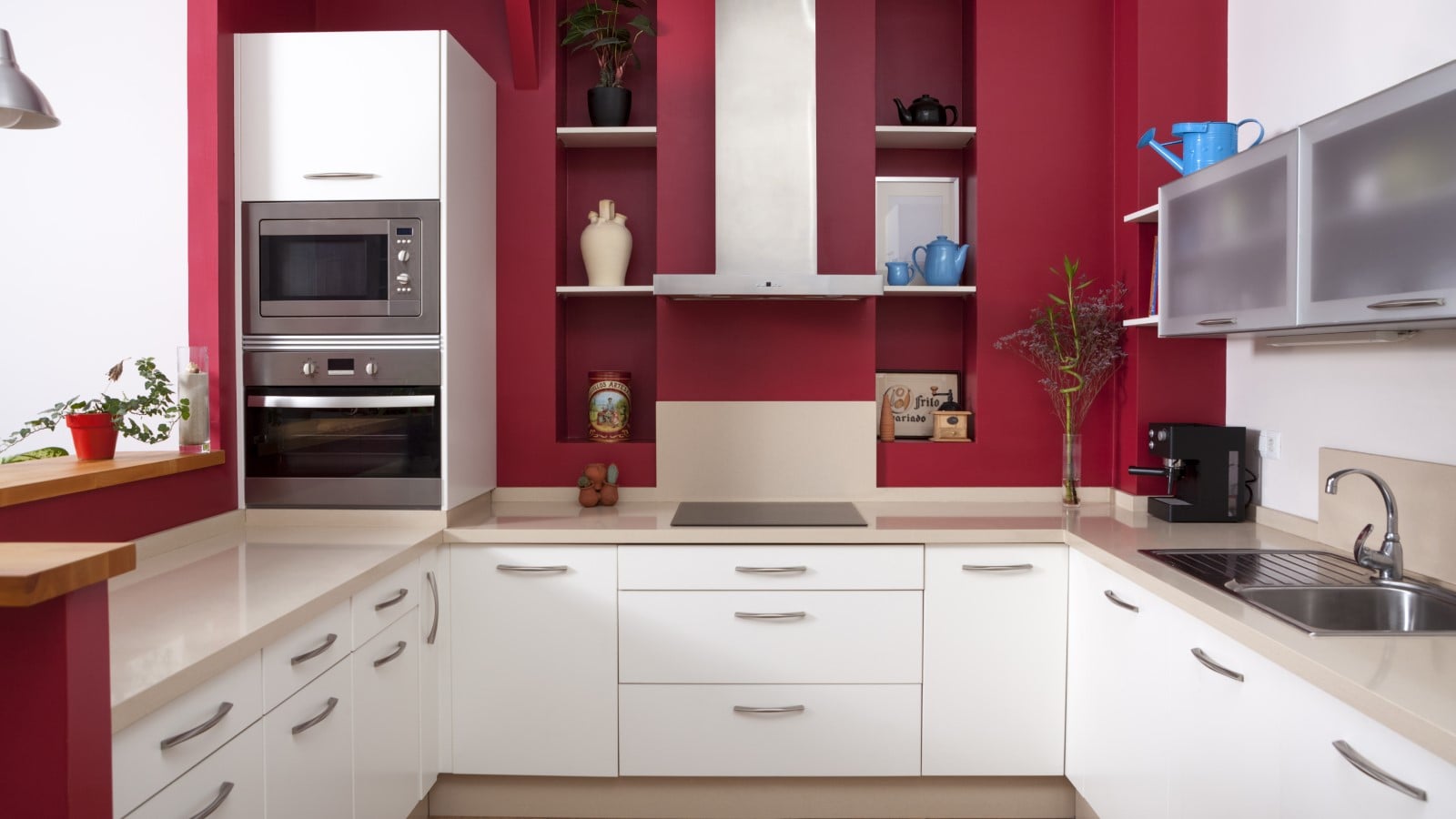 Modern,Kitchen,Interior,With,Red,Walls,And,White,Furniture