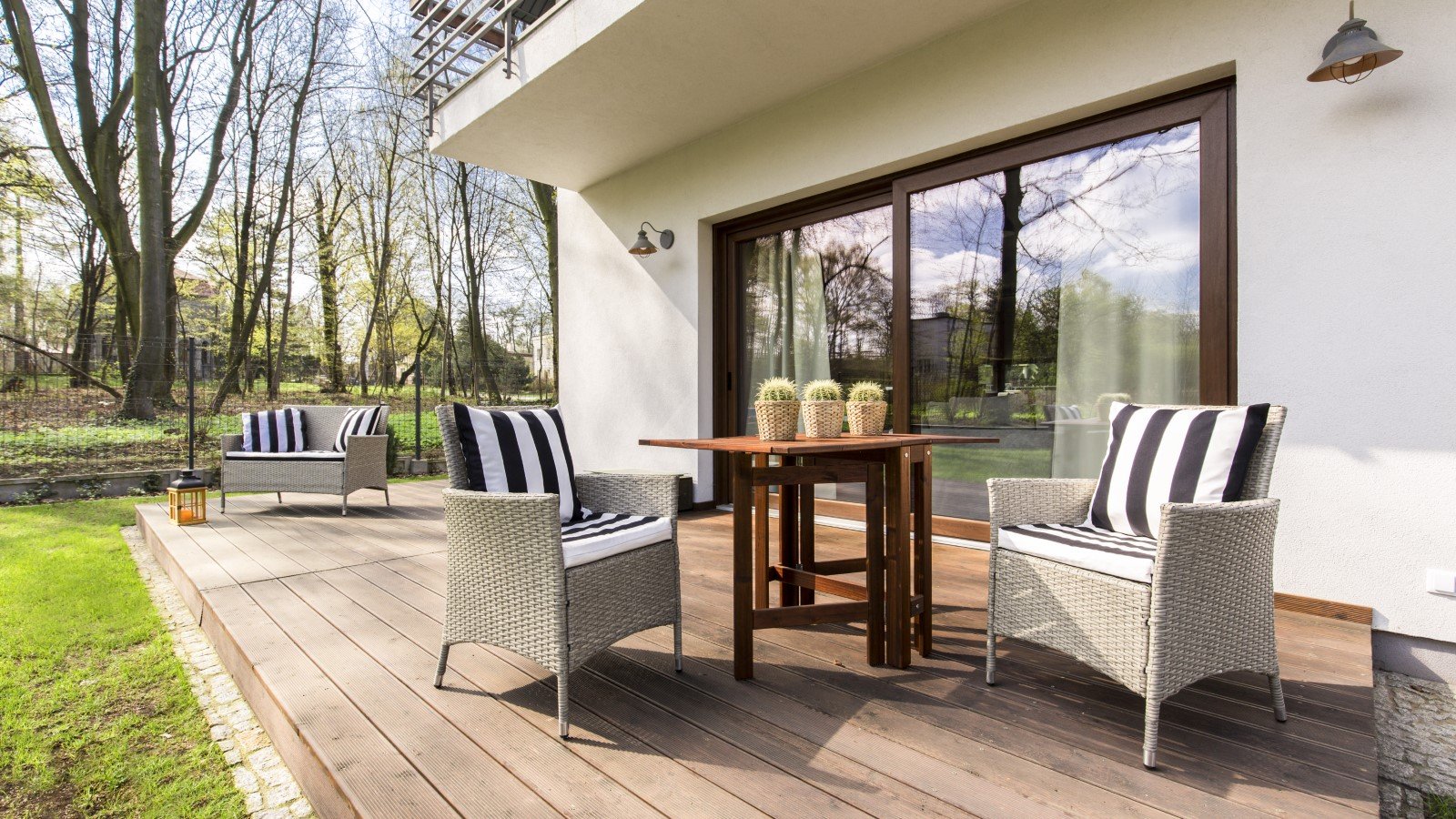 Big,Wooden,Cozy,Porch,With,Chairs,And,Coffee,Table,In
