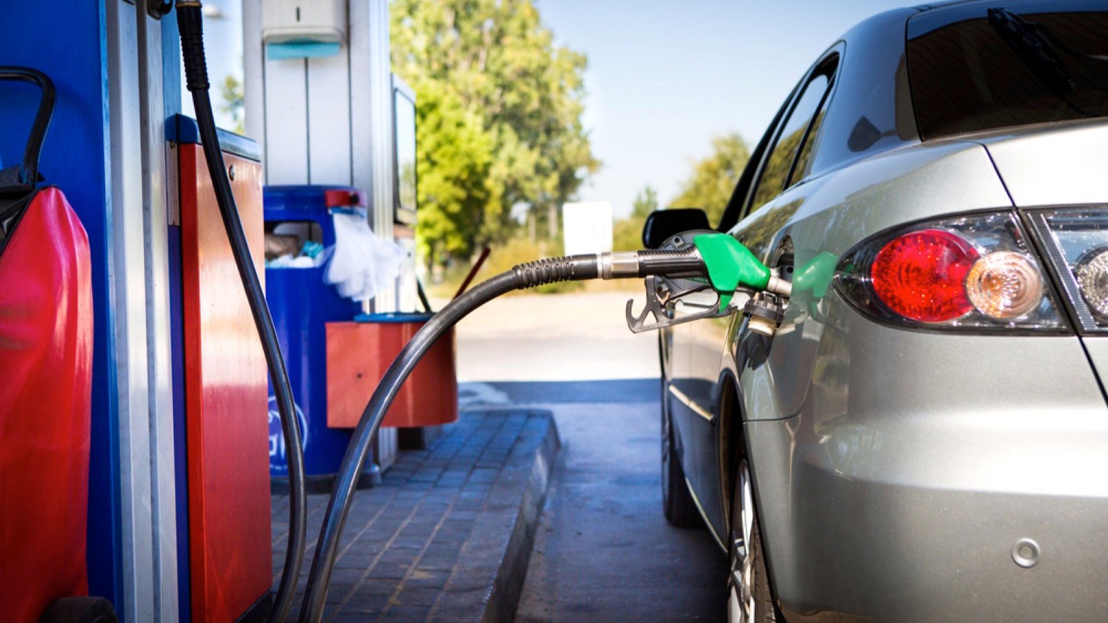Car refuelling in petrol station