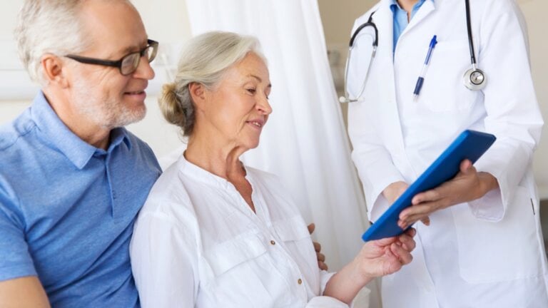 Couples consulting doctor