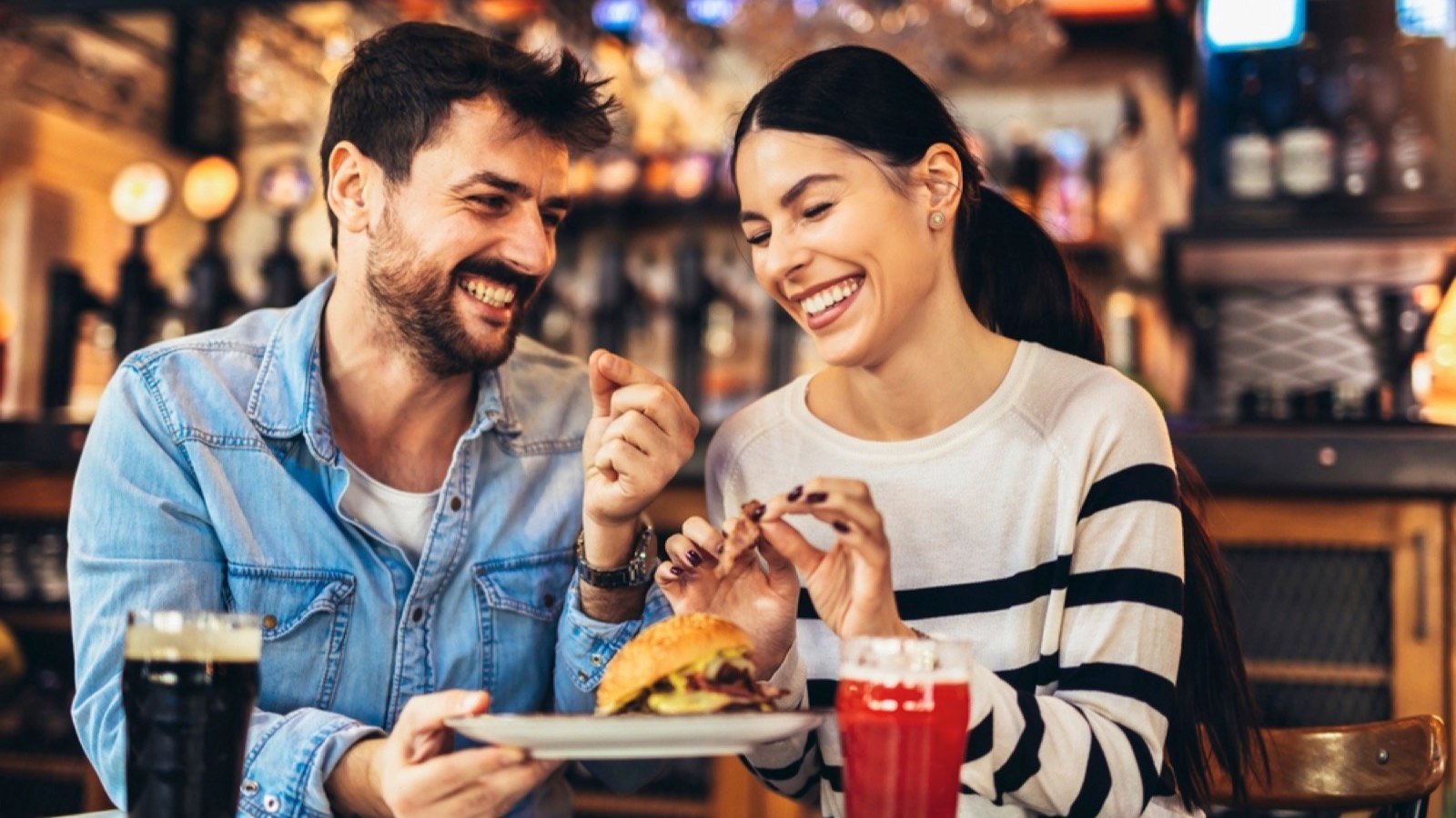 Couples eating in restaurant