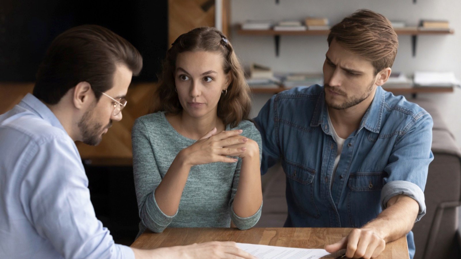 Couples talking to landlord