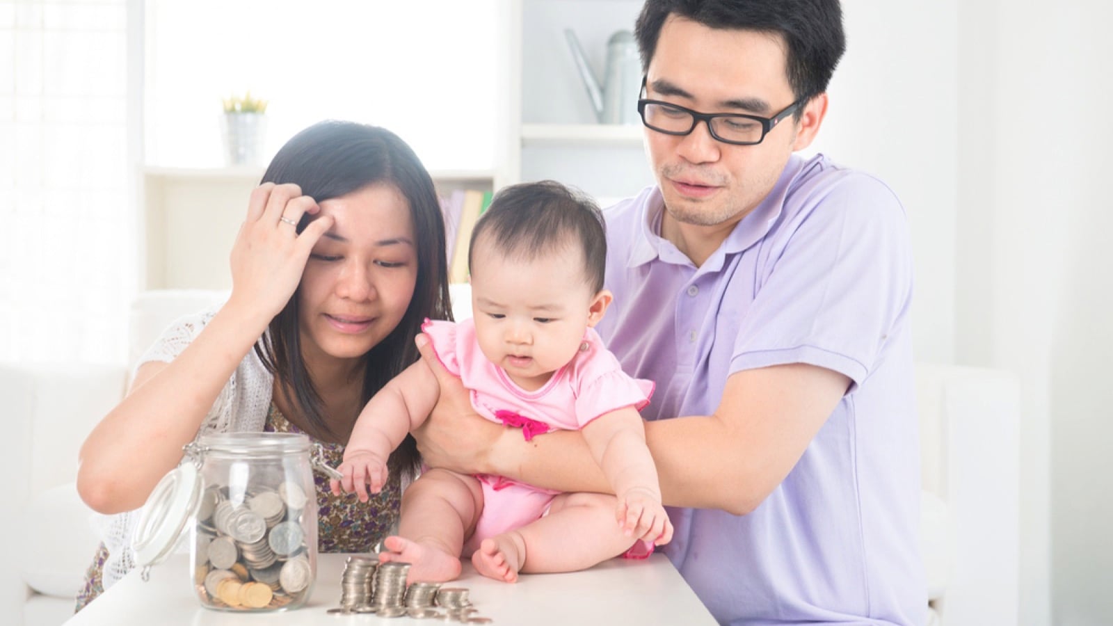 Couples with baby saving money