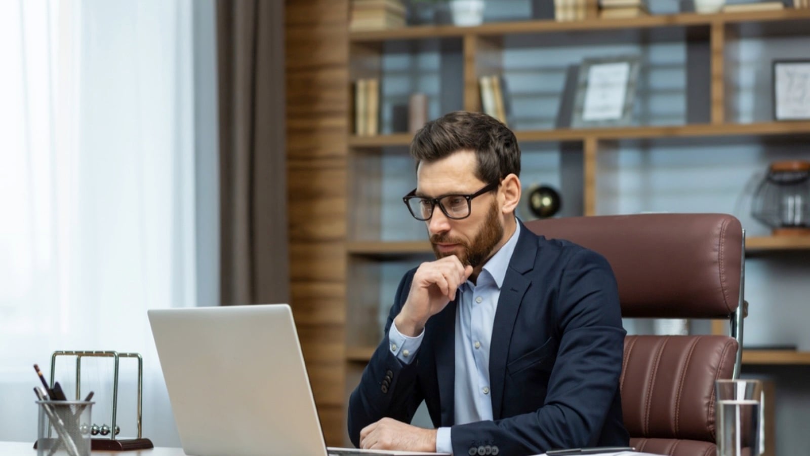 Man in office with laptop