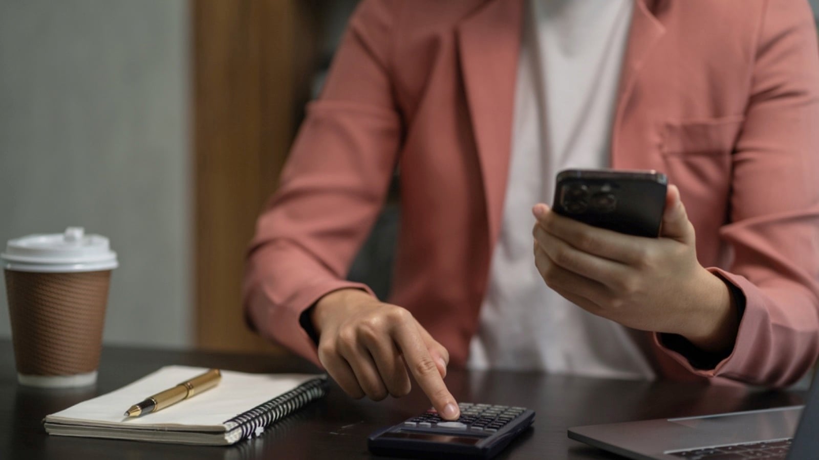 Man planning budget with app