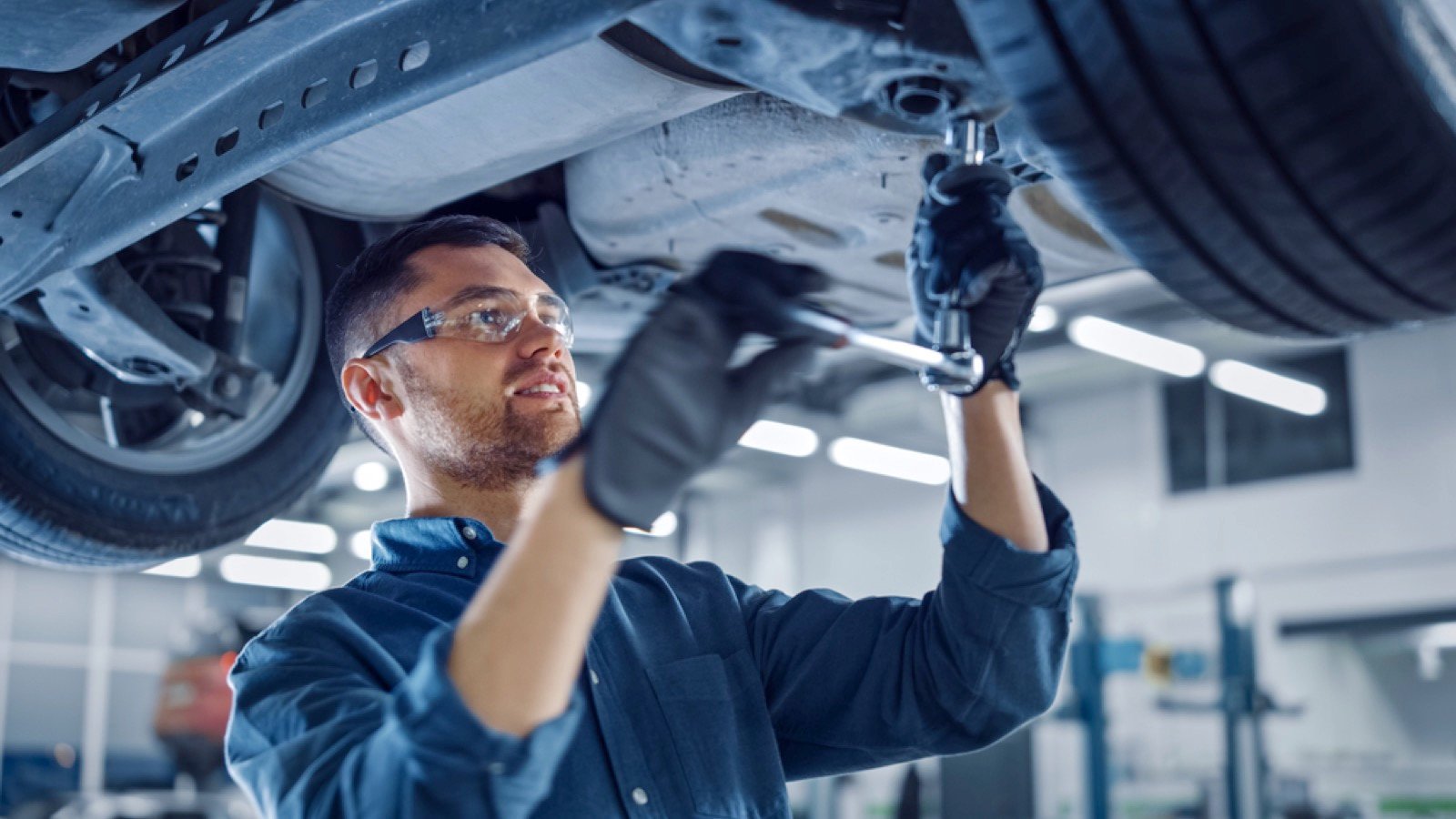 Man repairing car