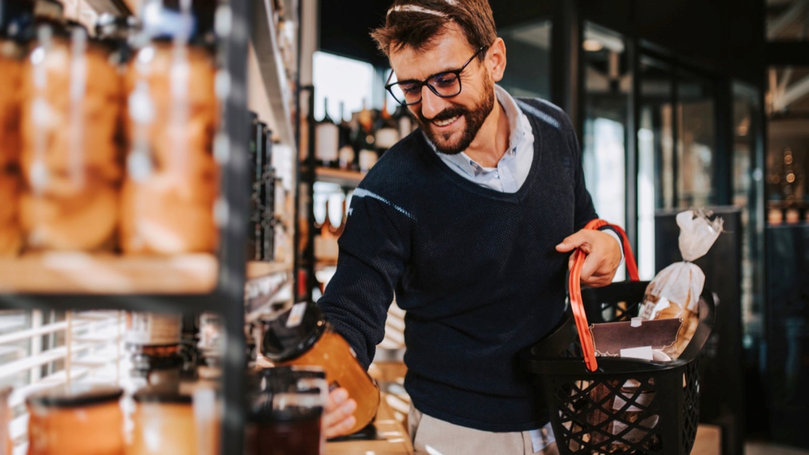 Middle aged man buying grocery
