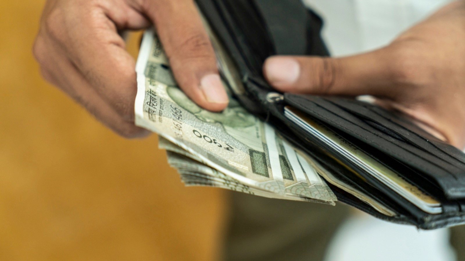 Traveler with Indian rupees