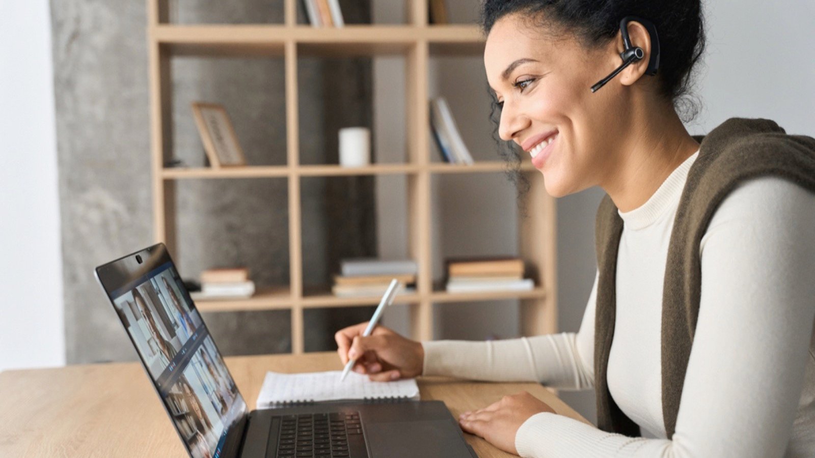 Woman in meeting working remote