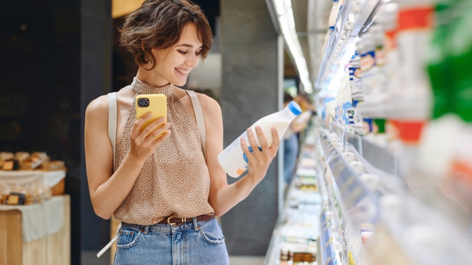 Woman shopping and comparing prices