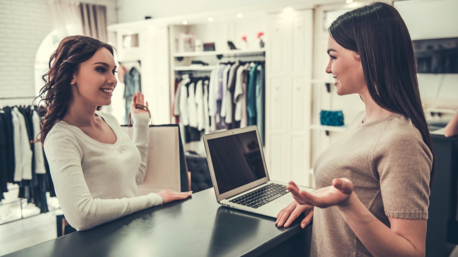 Woman talking to sales person