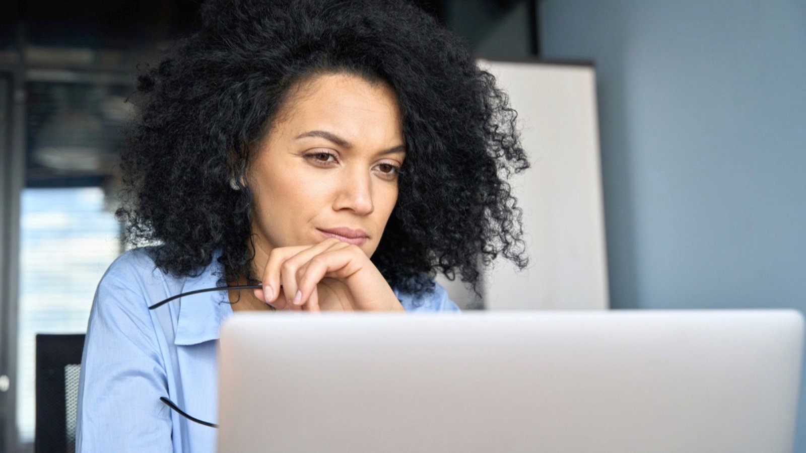 Woman thinking about financial needs