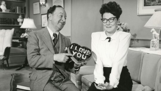 Nostalgia image of couple in 1940s setting