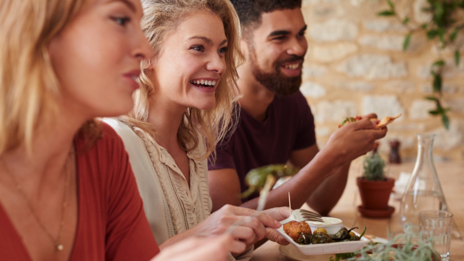 Friends eating in a restaurant