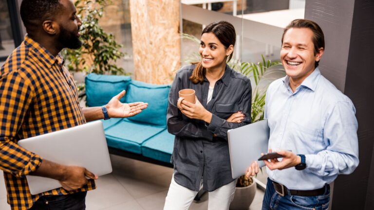 millennials and gen x talking in a group