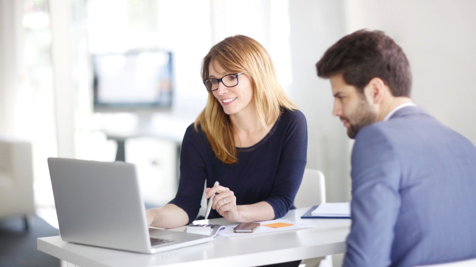 Man consulting financial advisor