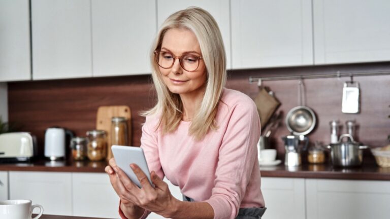 Middle age woman using budget app