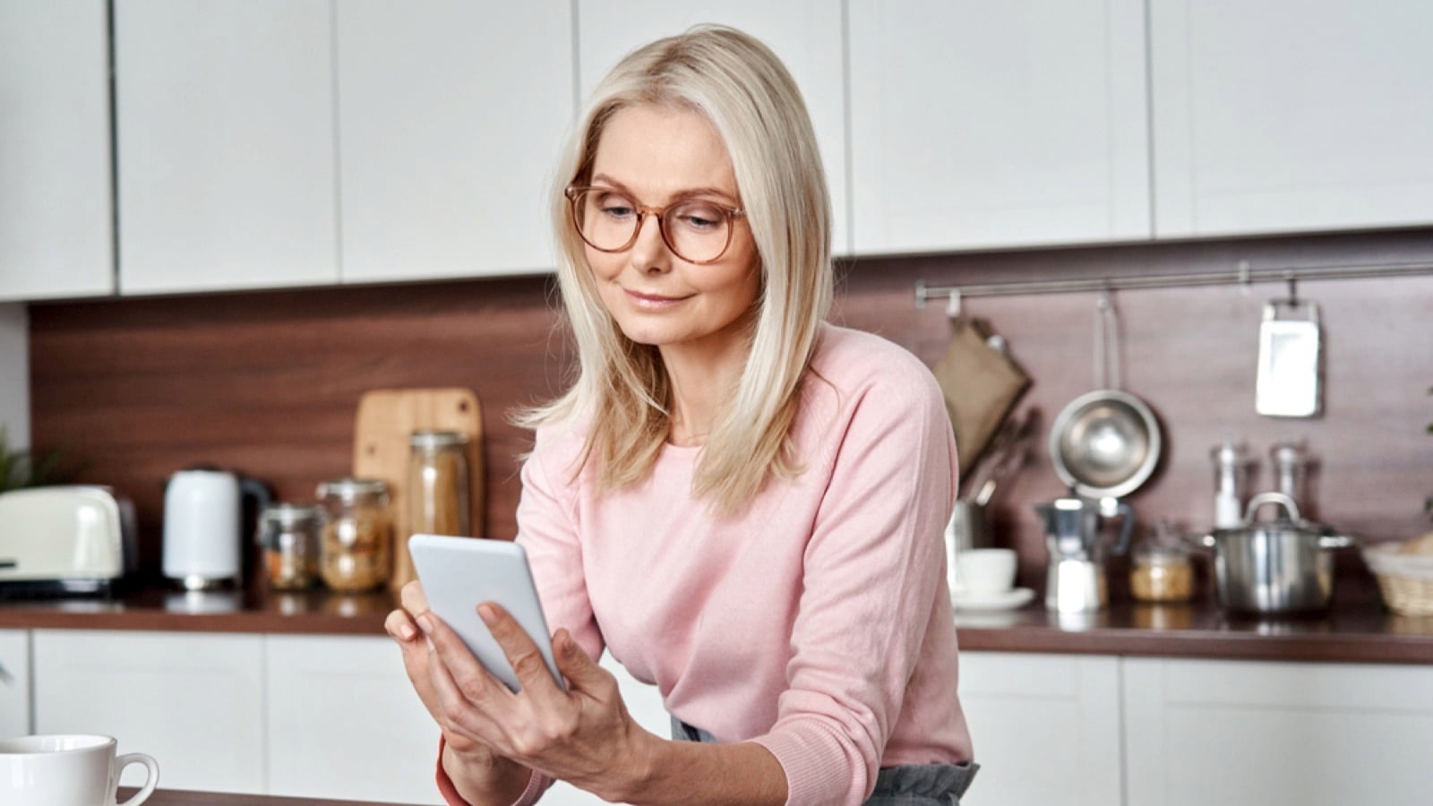 Middle age woman using budget app