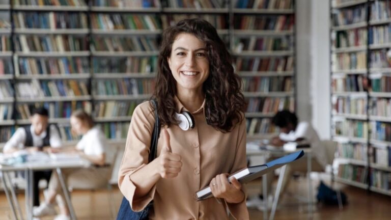 Student in college library