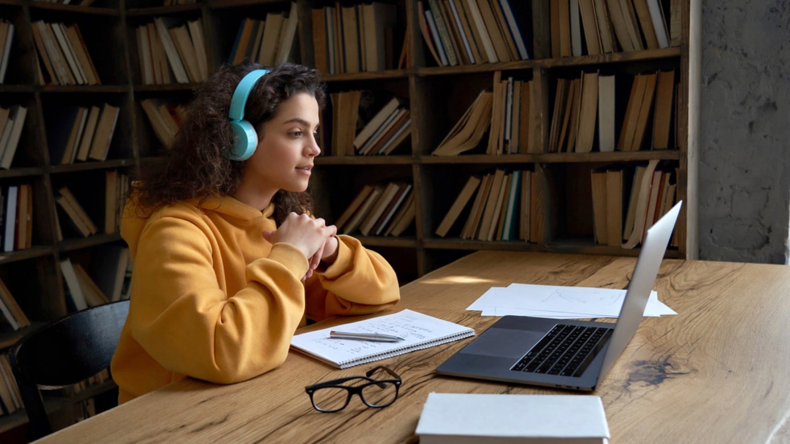 Woman in study room in library