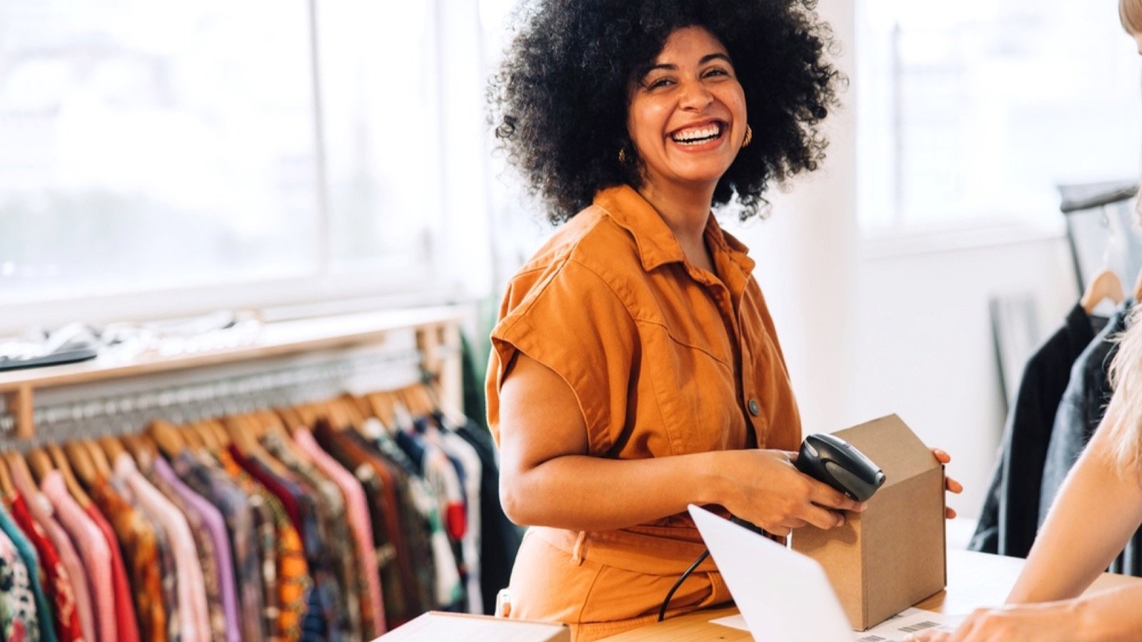 Woman running online thrift stores