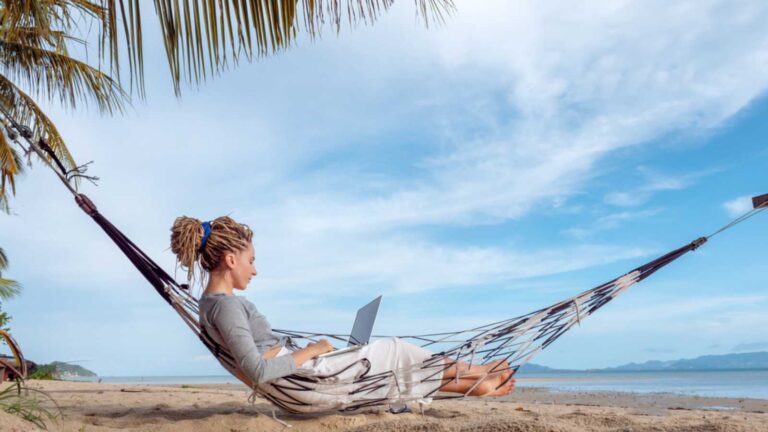 Woman working in beach