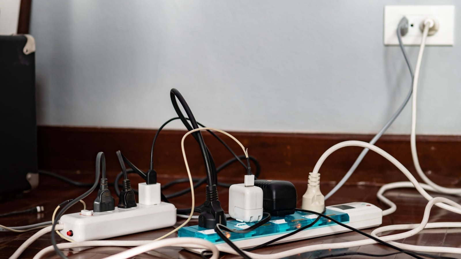 Overloaded power sockets with damaged wires